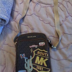 Michael Kors Black and Tan Route MK bag